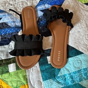 Sandals with black frill detail